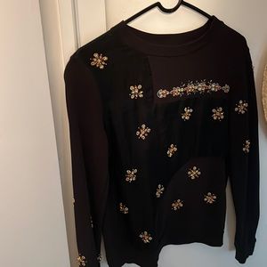 Size small bedazzled black shirt slightly see through